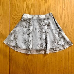 NAVEN x REVOLVE Snakeskin Print Flare mini Skirt
